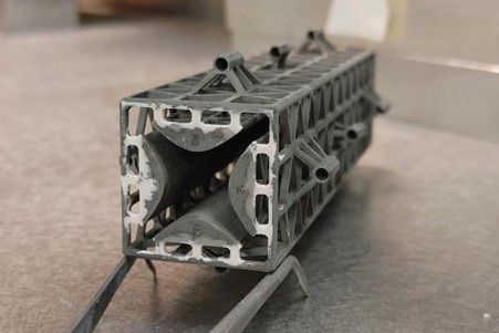 This photo shows an example of a 3D-printed miniaturized QMF. This photo shows an example of a 3D-printed miniaturized QMF.