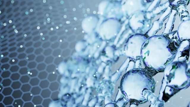 Close-up of molecule microarrays featuring transparent molecular structures against a hexagonal patterned background. 