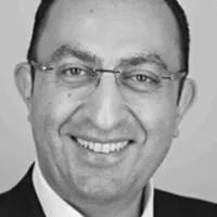 Credit: Alexander Seyf. Headshot of Alexander Seyf in greyscale.