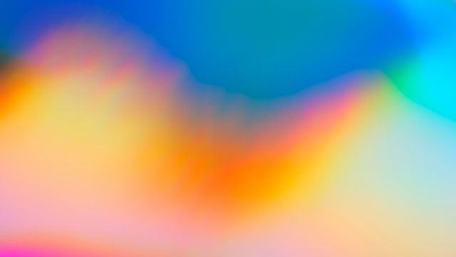 A blend of colours, blue, green, orange and purple. 