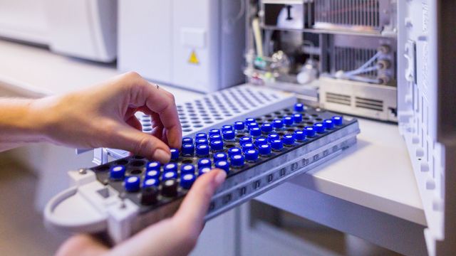 A laboratory scientist prepares samples for high-performance liquid chromatography-mass spectrometry. 