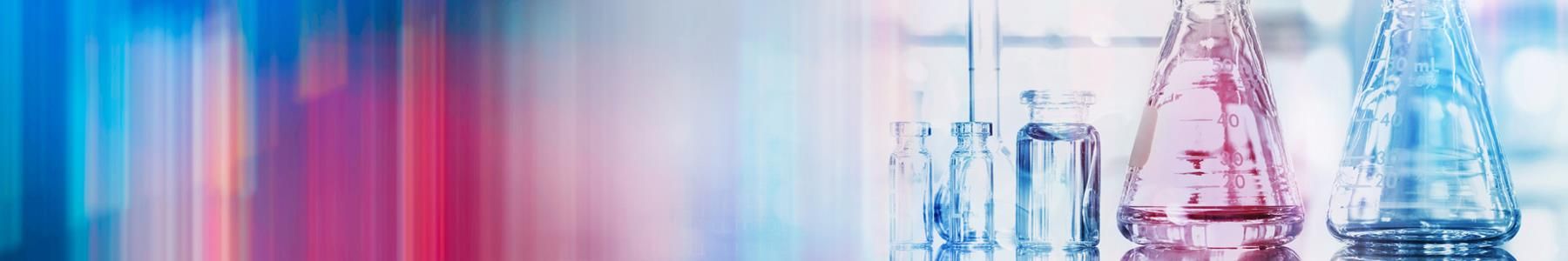 Laboratory glassware with liquids used in liquid chromatography experiments. 