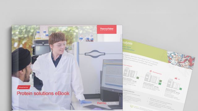 Scientists in a lab analyzing protein data on a computer for biotherapeutic research using Thermo Fisher Scientific equipment. 