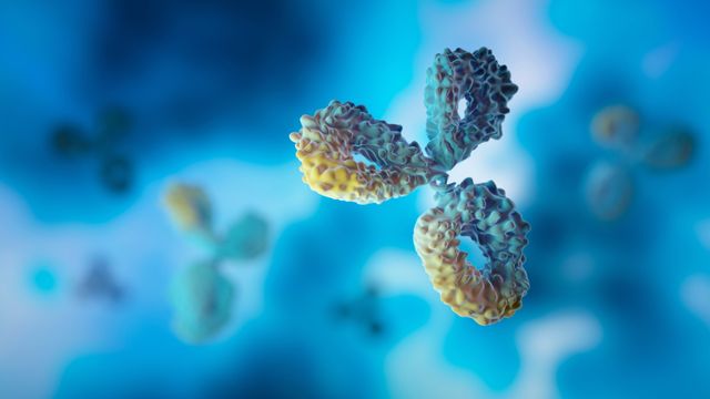 A 3D visualization of a virus on a blue background, highlighting its intricate design and biological characteristics. 